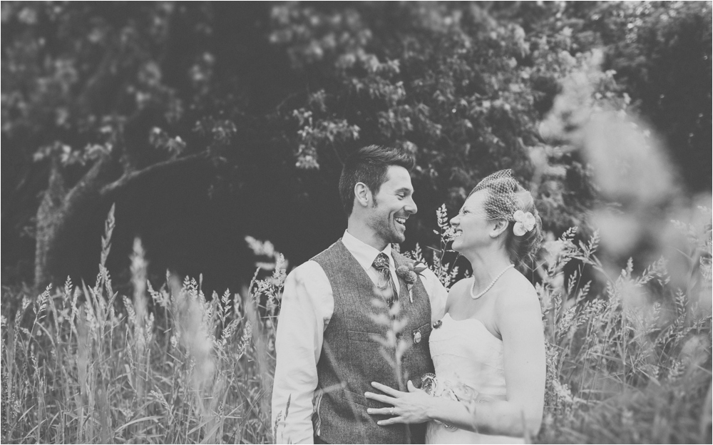 in a field wedding couple