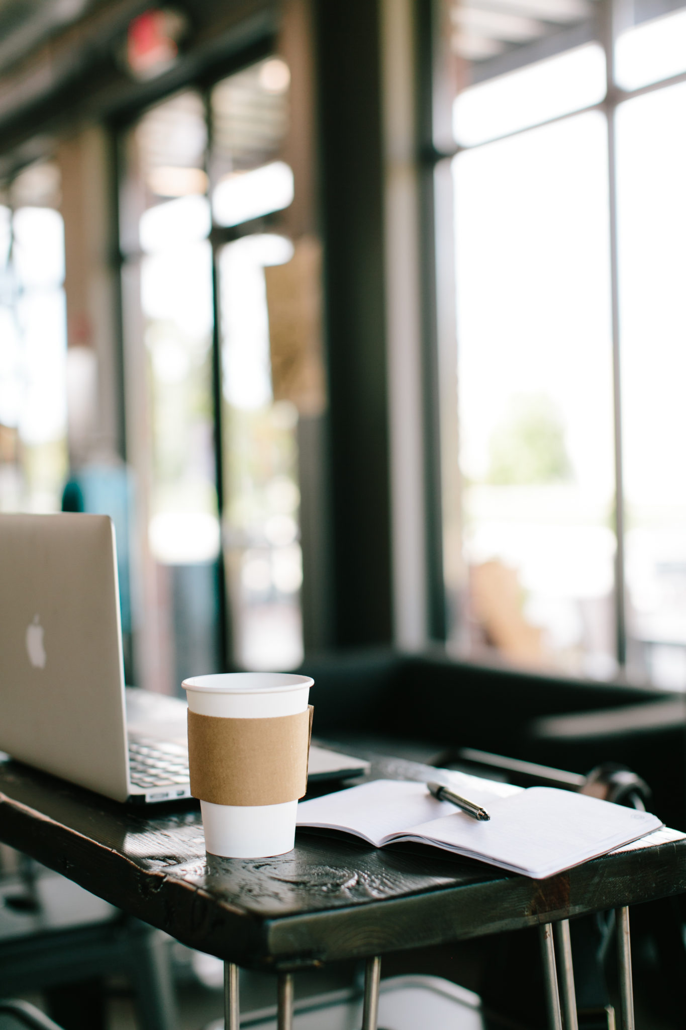 open laptop in coffee shop