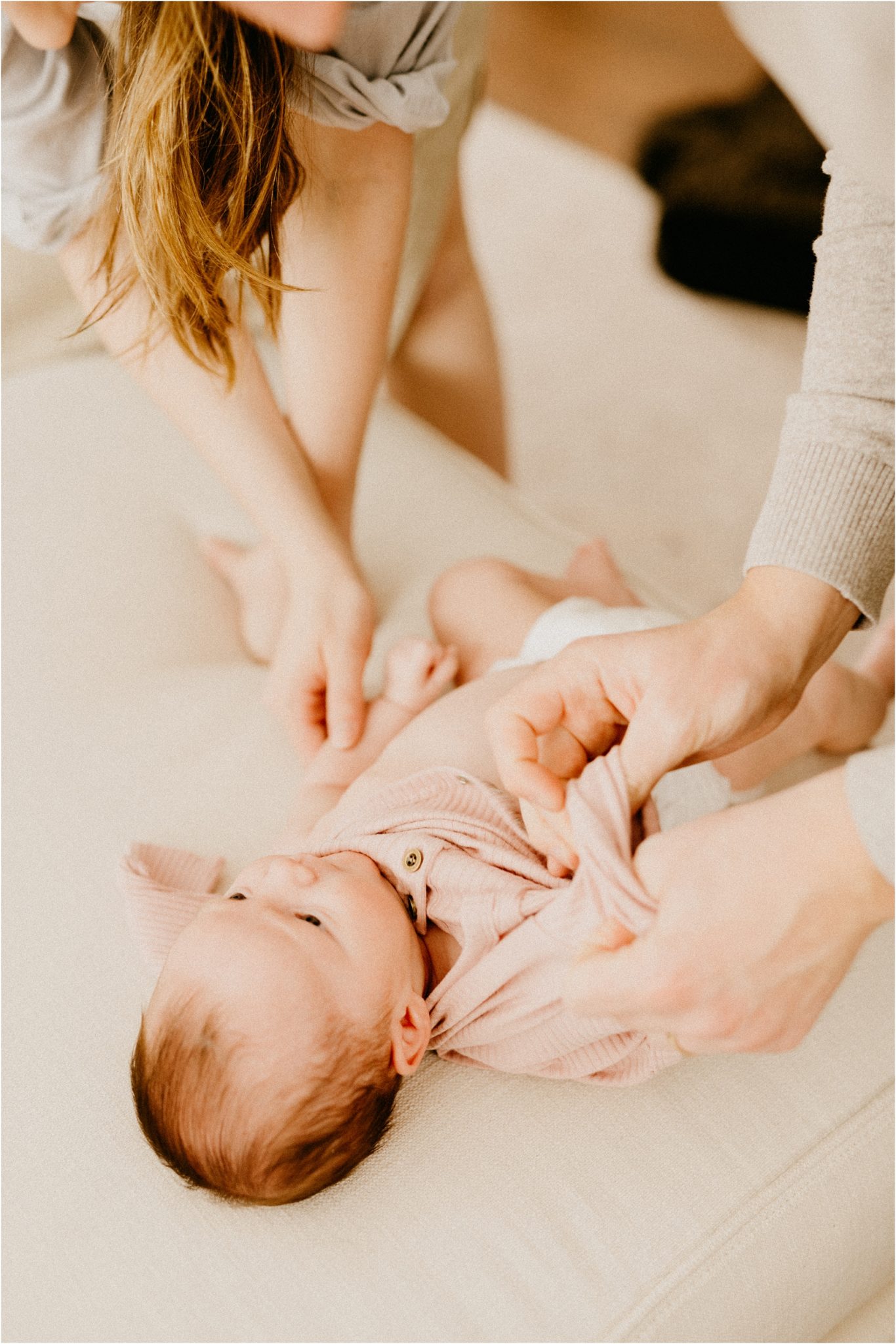 dressing newborn baby