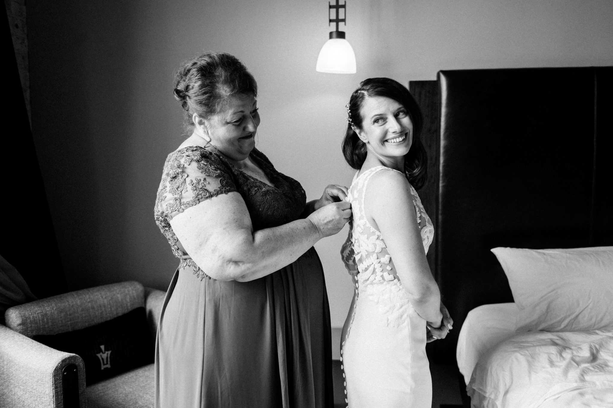 bride with mom getting ready