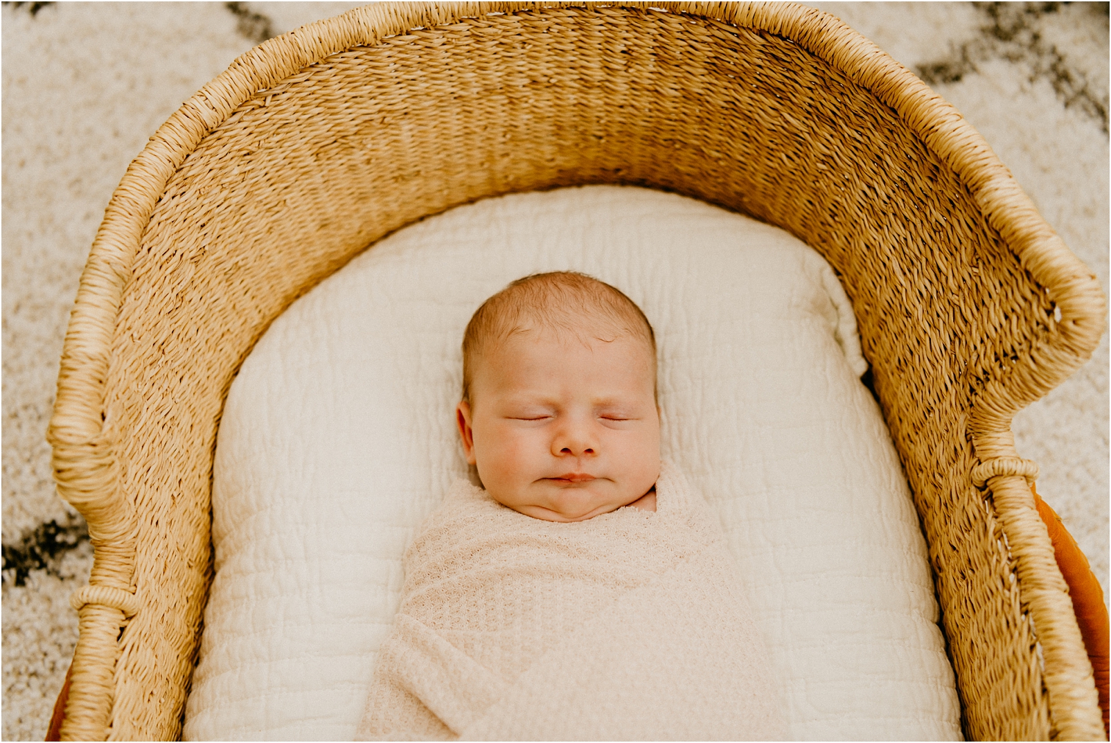  baby in a bassinet sleeping