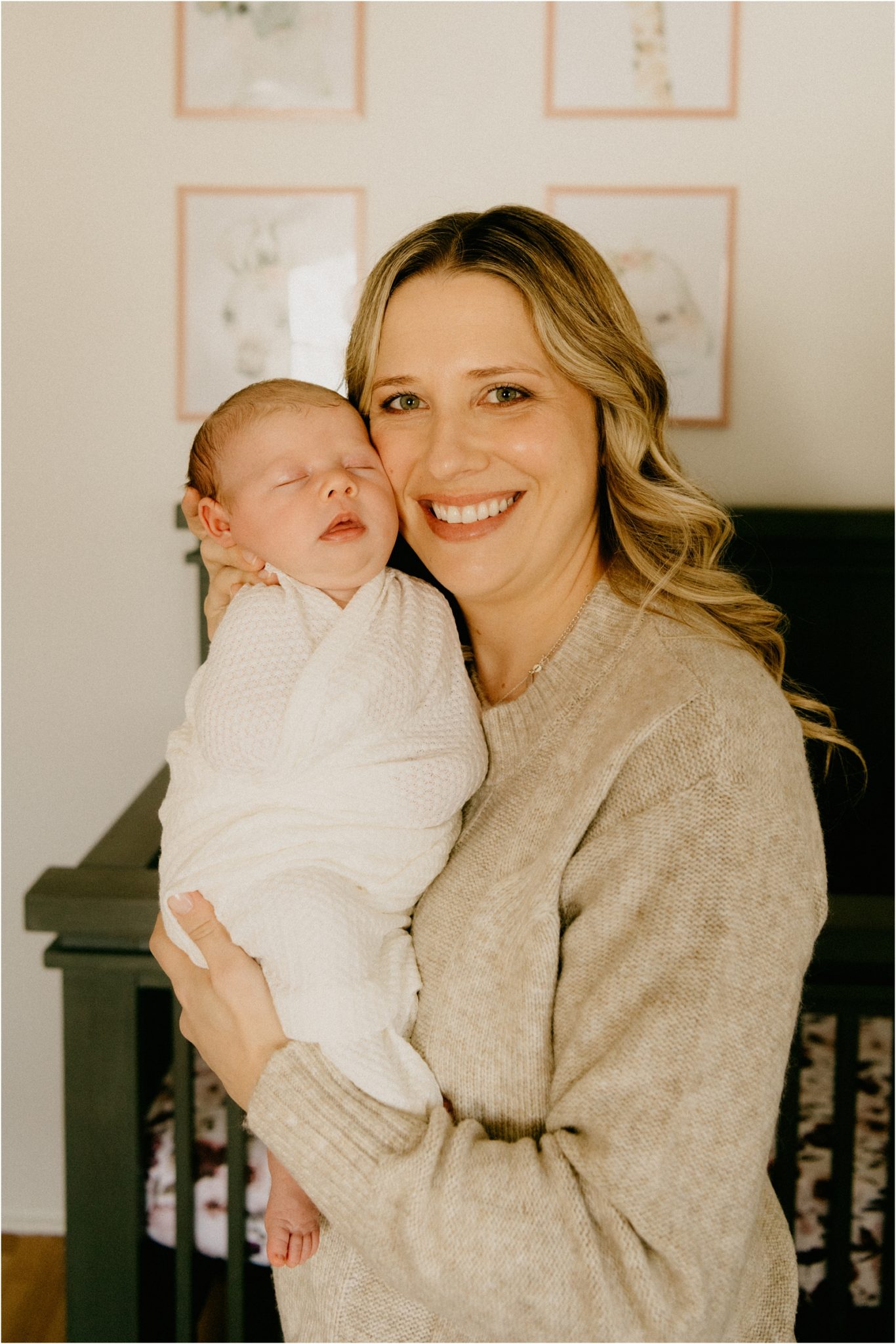 mom smiling with baby