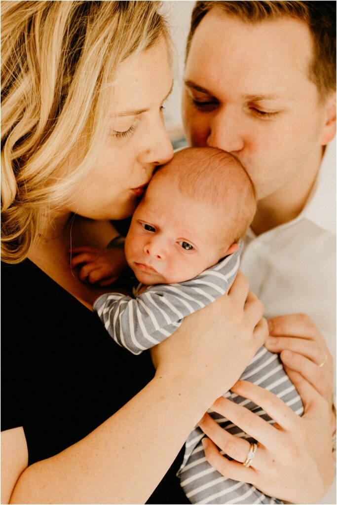 newborn baby with mom and dad