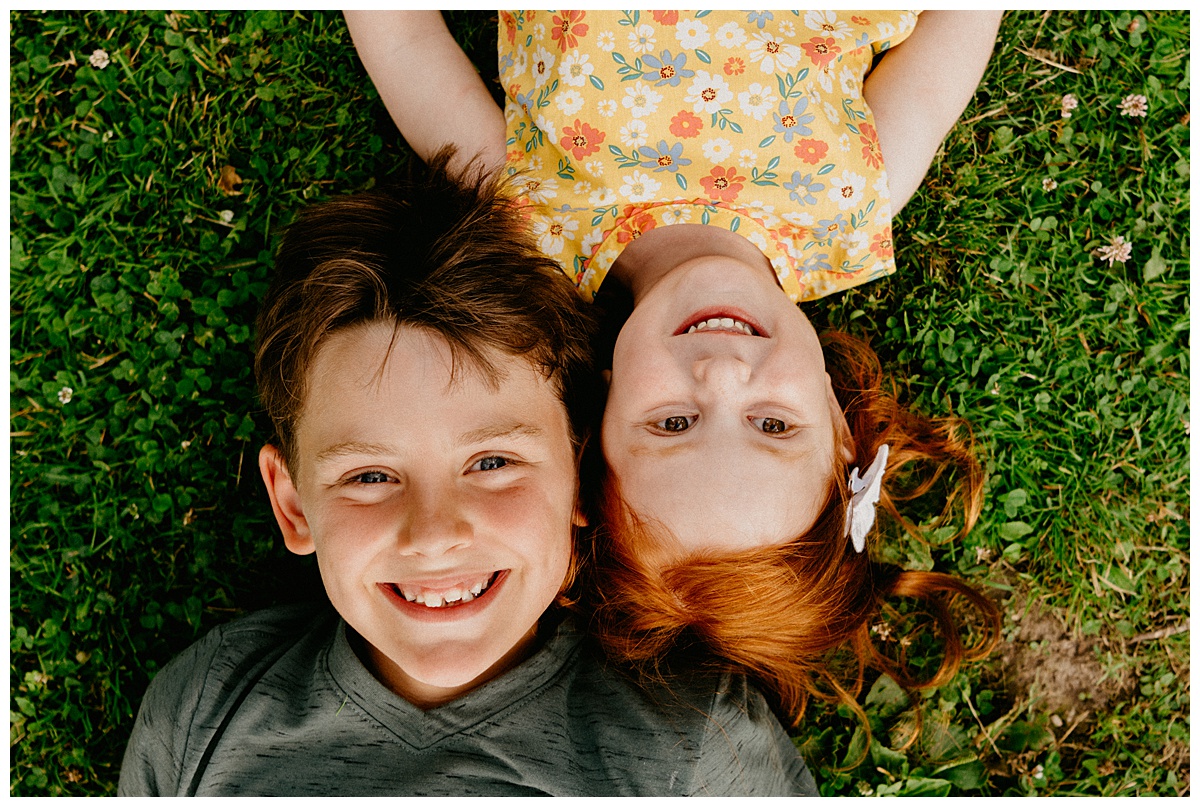 girl and boy smiling at camera