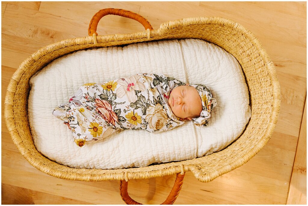 baby in a basket sleeping