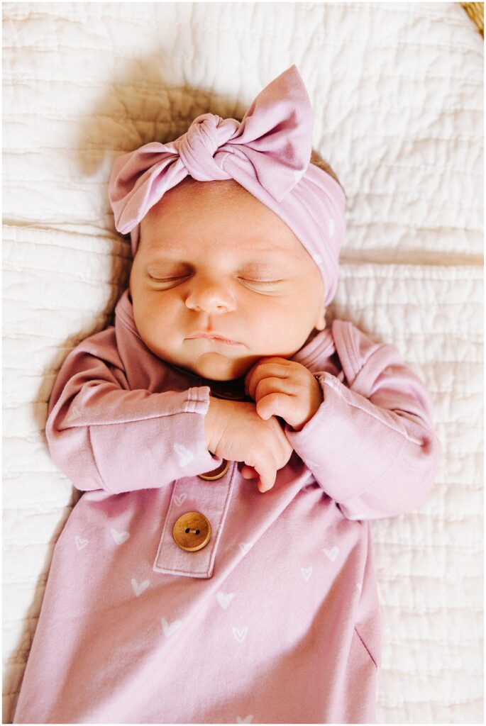newborn baby girl wearing pink