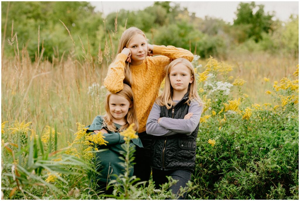 three sisters in a field