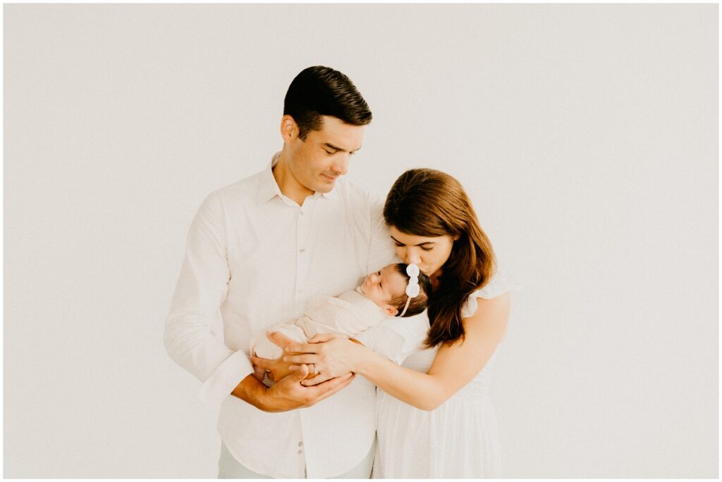 mom and dad and infant