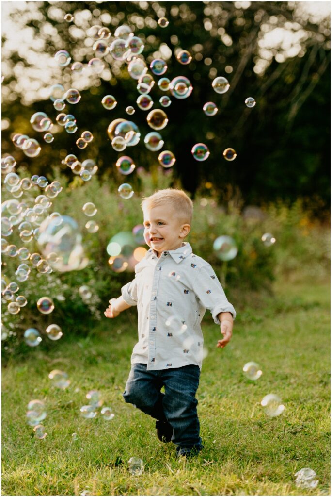 happy boy with bubbles