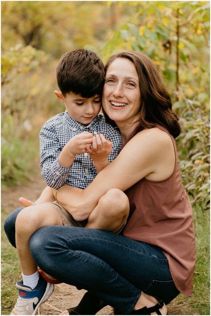 mom holding little boy