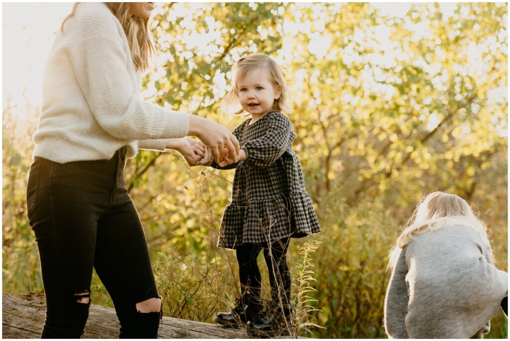 mom with daughter at park