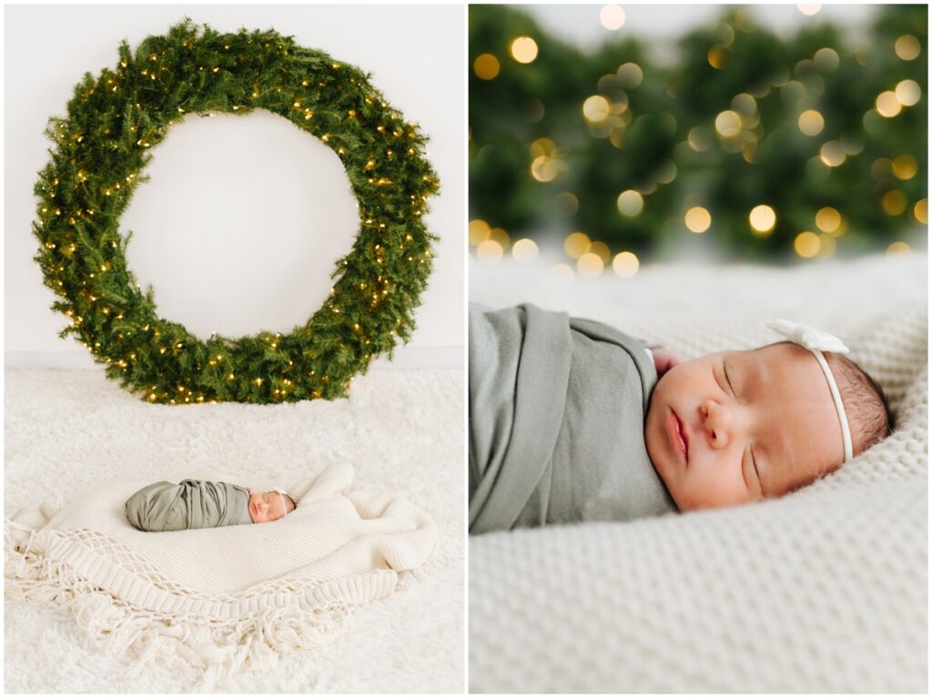 newborn baby near a christmas wreath