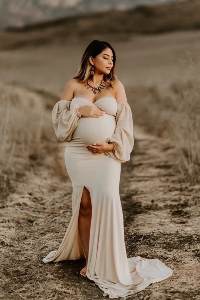 woman wearing beige mermaid-fit maternity gown