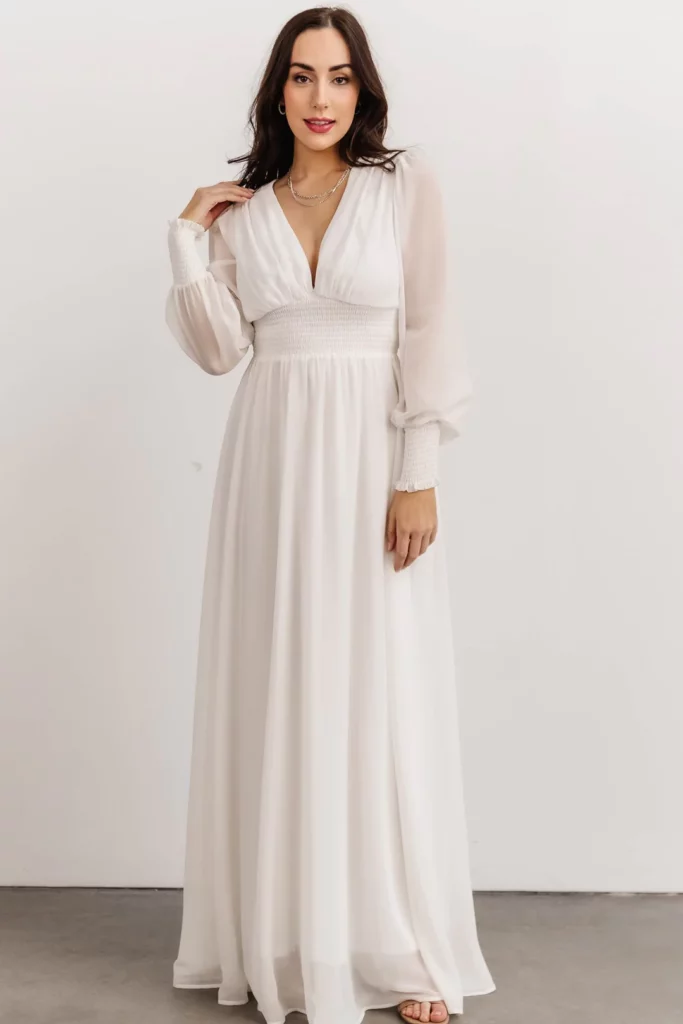 woman wearing maternity gown for photo shoot