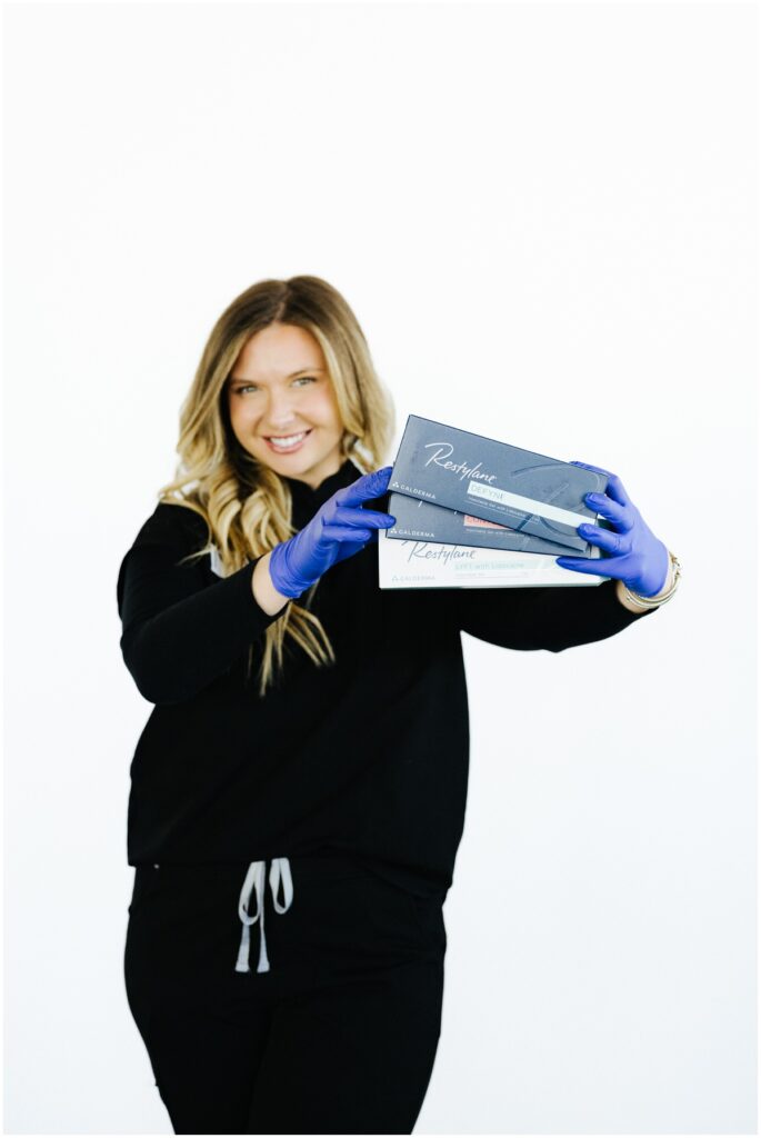 nurse holding product with blue gloves