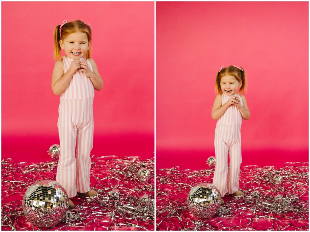 adorable girl on pink backdrop valentine's day photo session