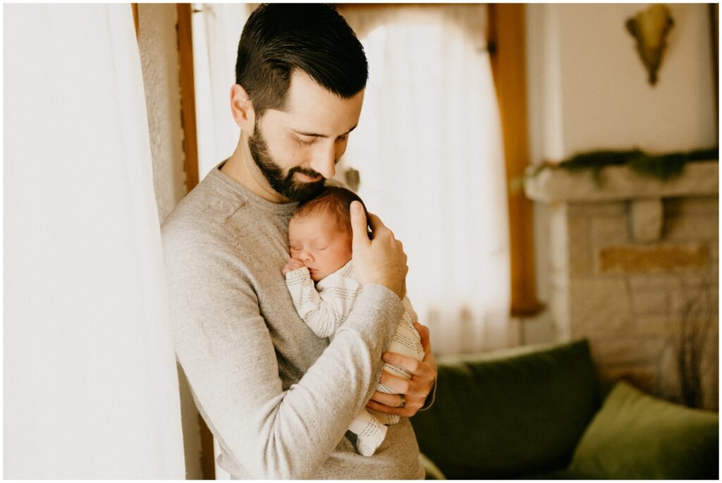 dad holding baby boy