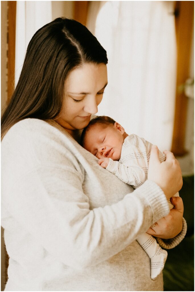 mom holding infant