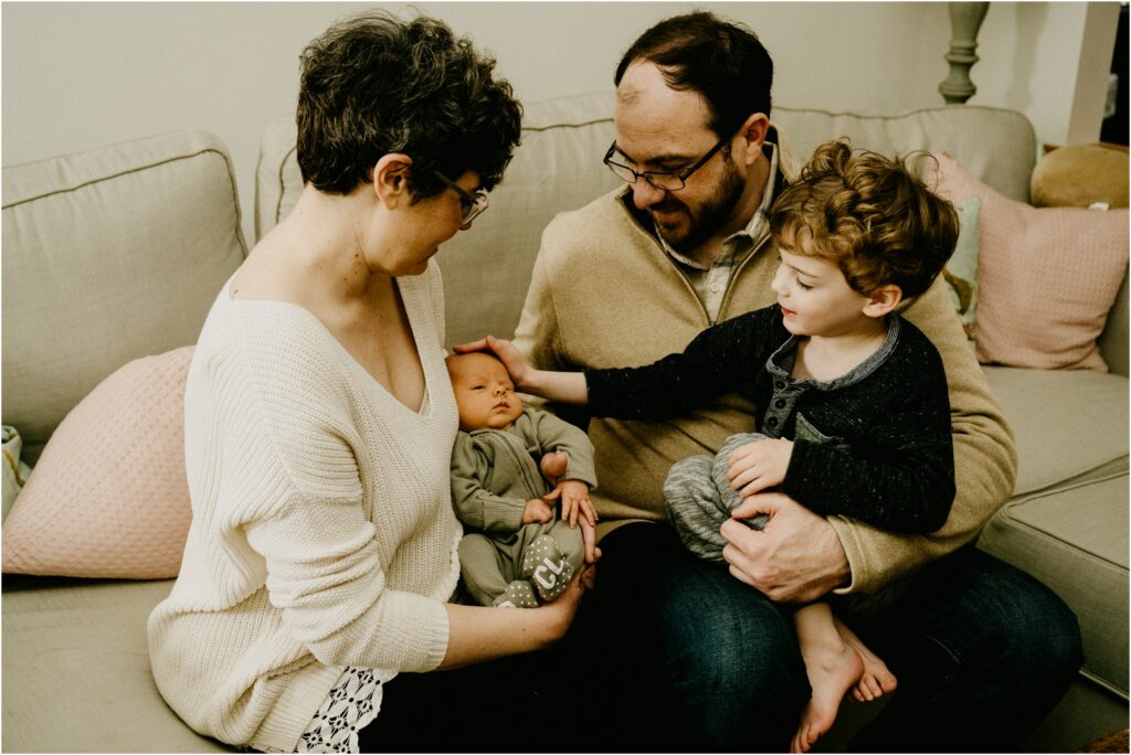 family with newborn baby