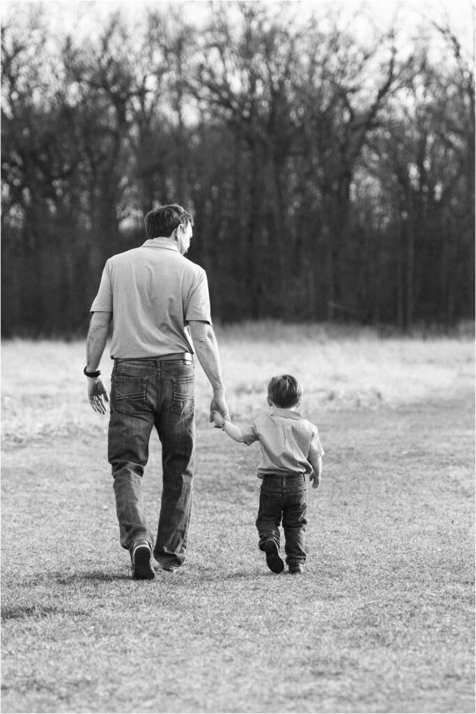 dad and son walking away