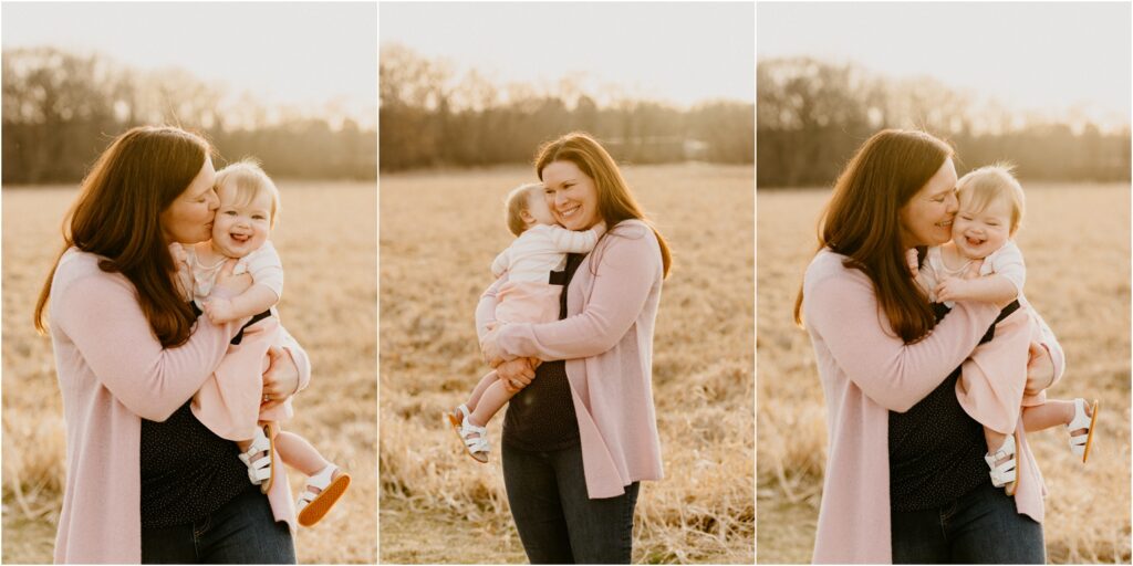 mom hugging daughter baby