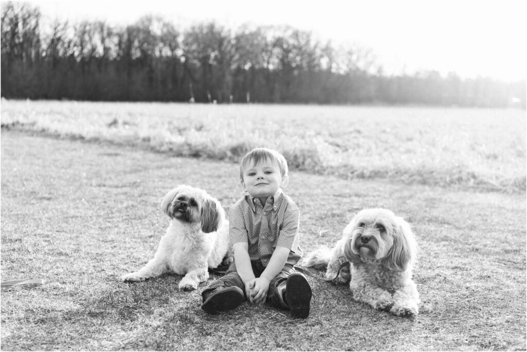 boy with two dogs