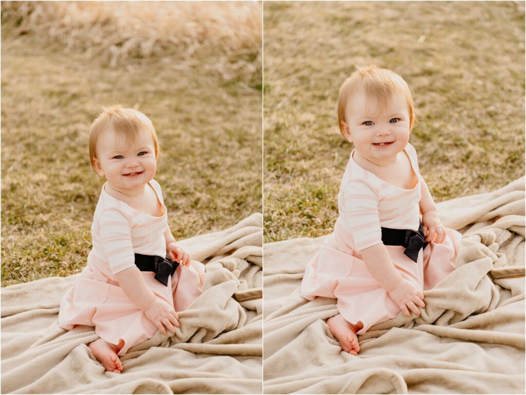 little girl smiling on grass