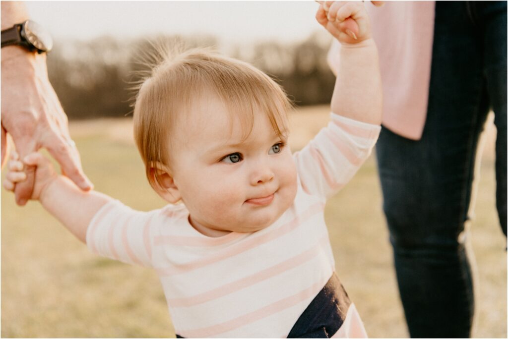 baby girl learning to walk