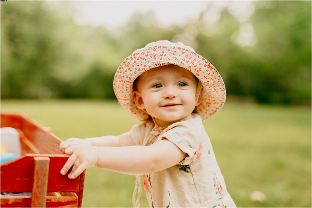 smiling little girl with a cute hat