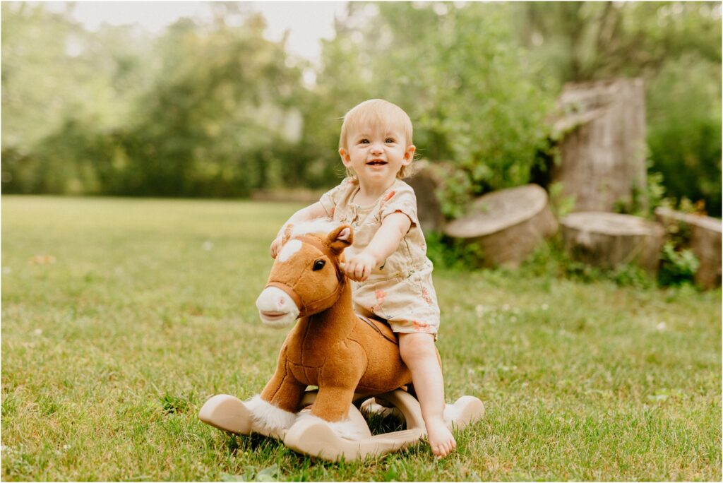 little girl on rocking horse