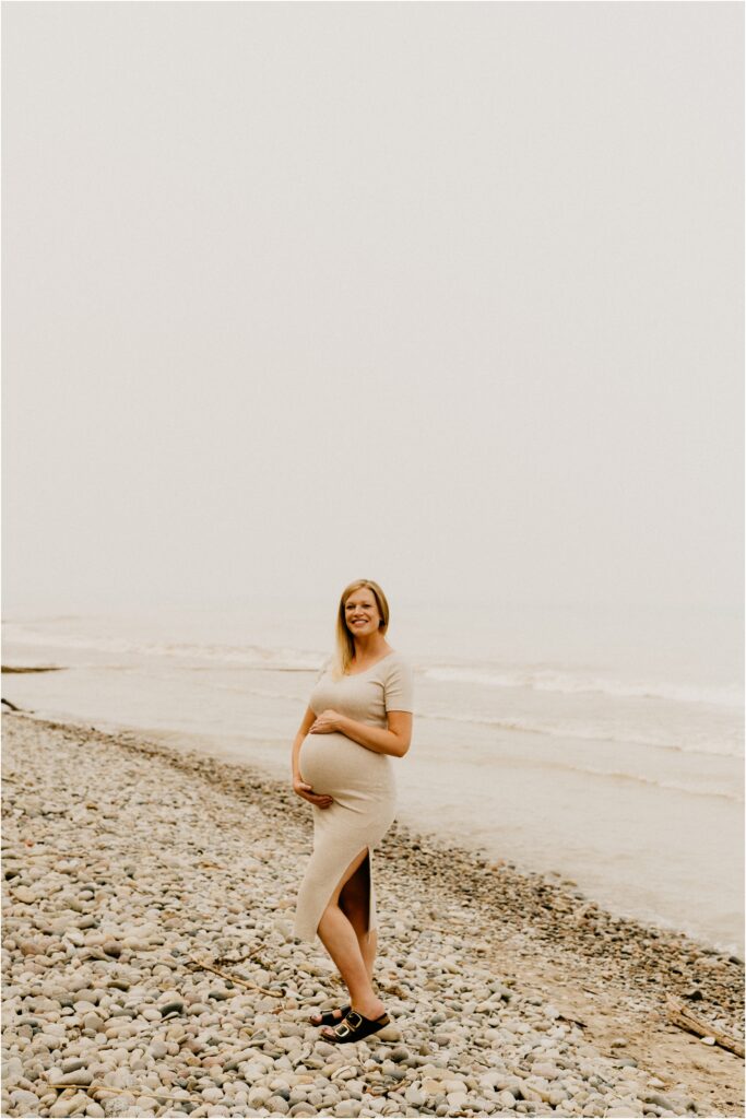 pregnant woman by lake michigan