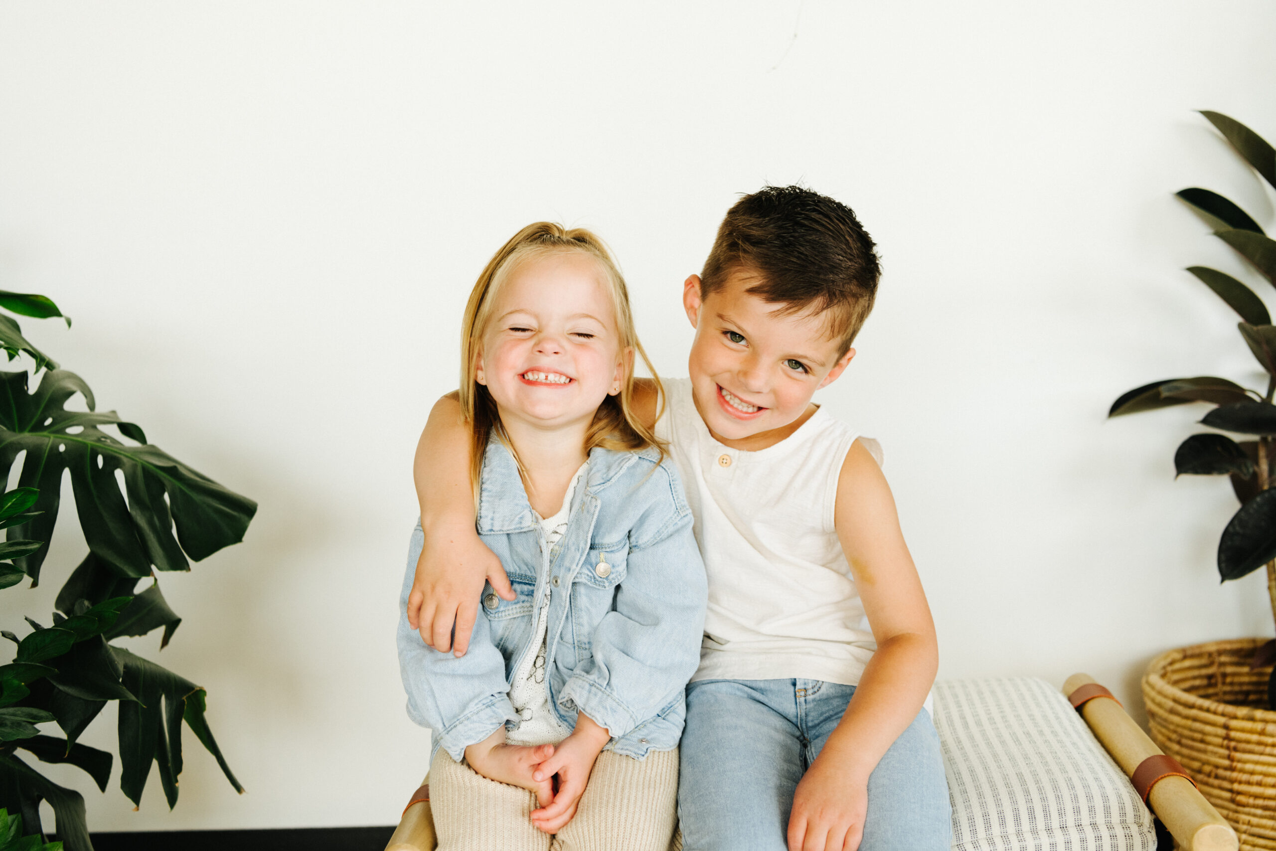 brother and sister kids hugging