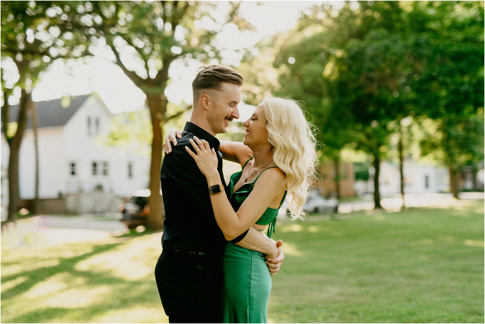 a women and man hugging in the park