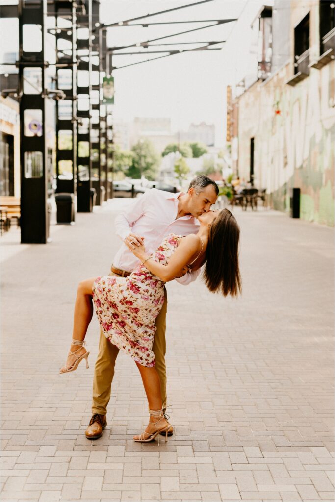 a couple kissing in the city