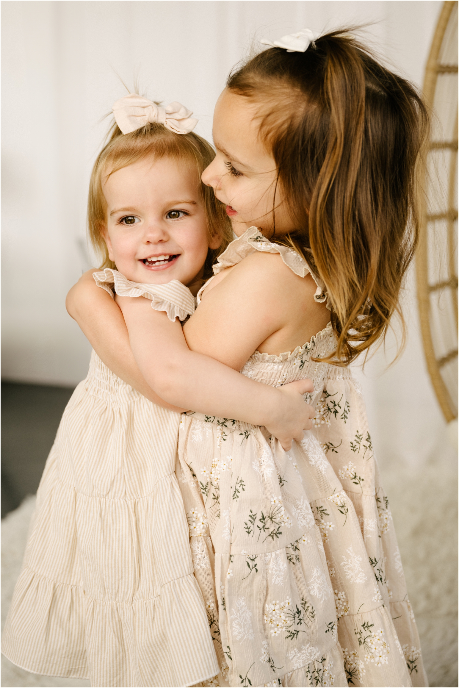 two sisters hugging