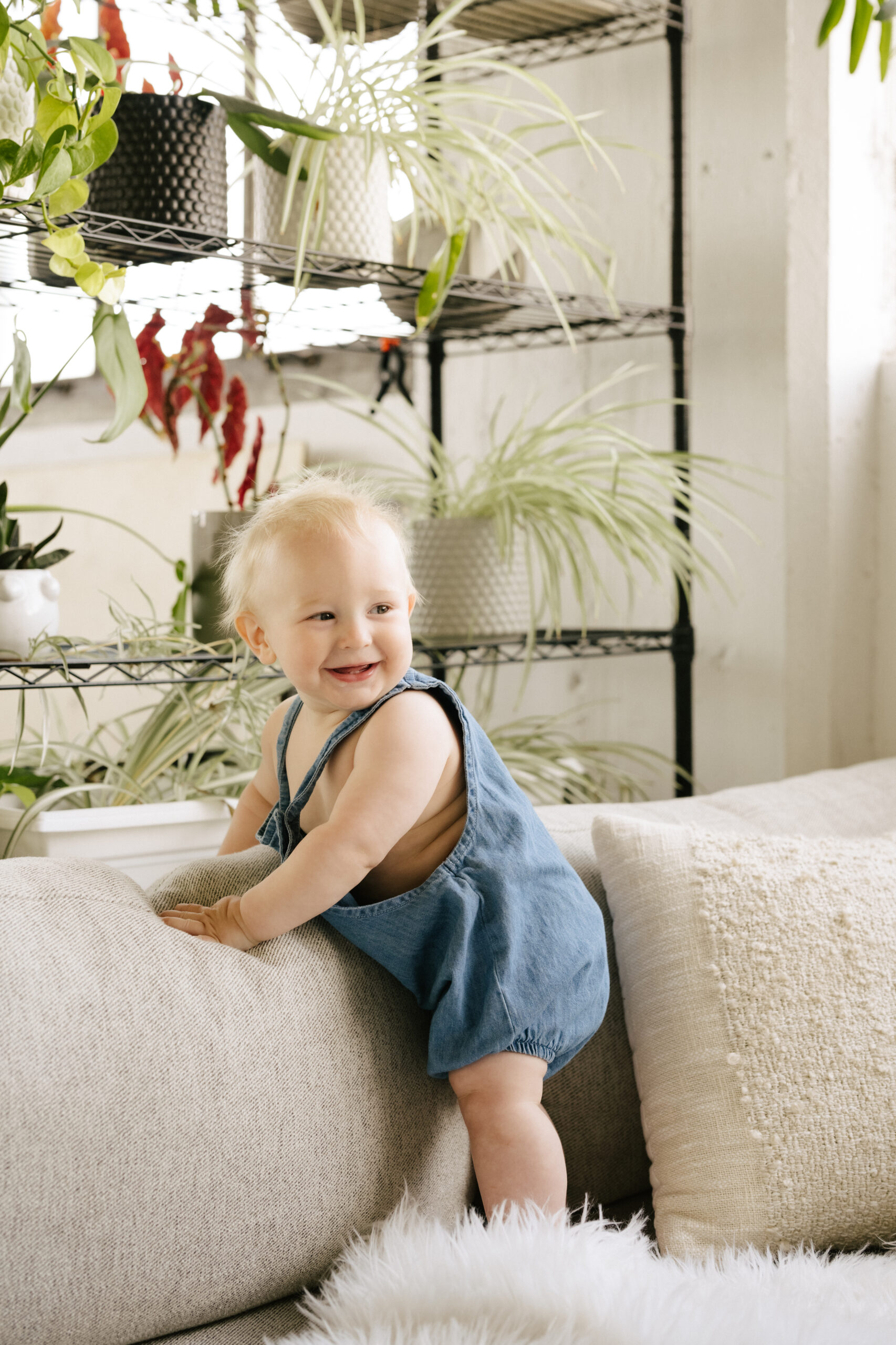 little boy happy at the studio smiling