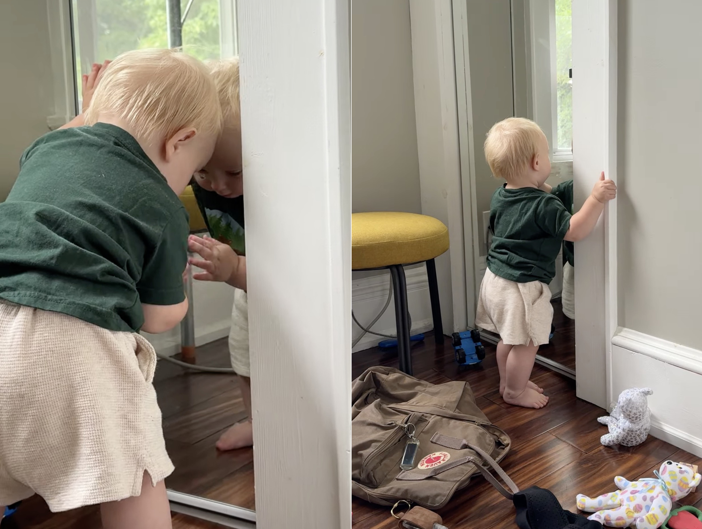 little boy looking in mirror