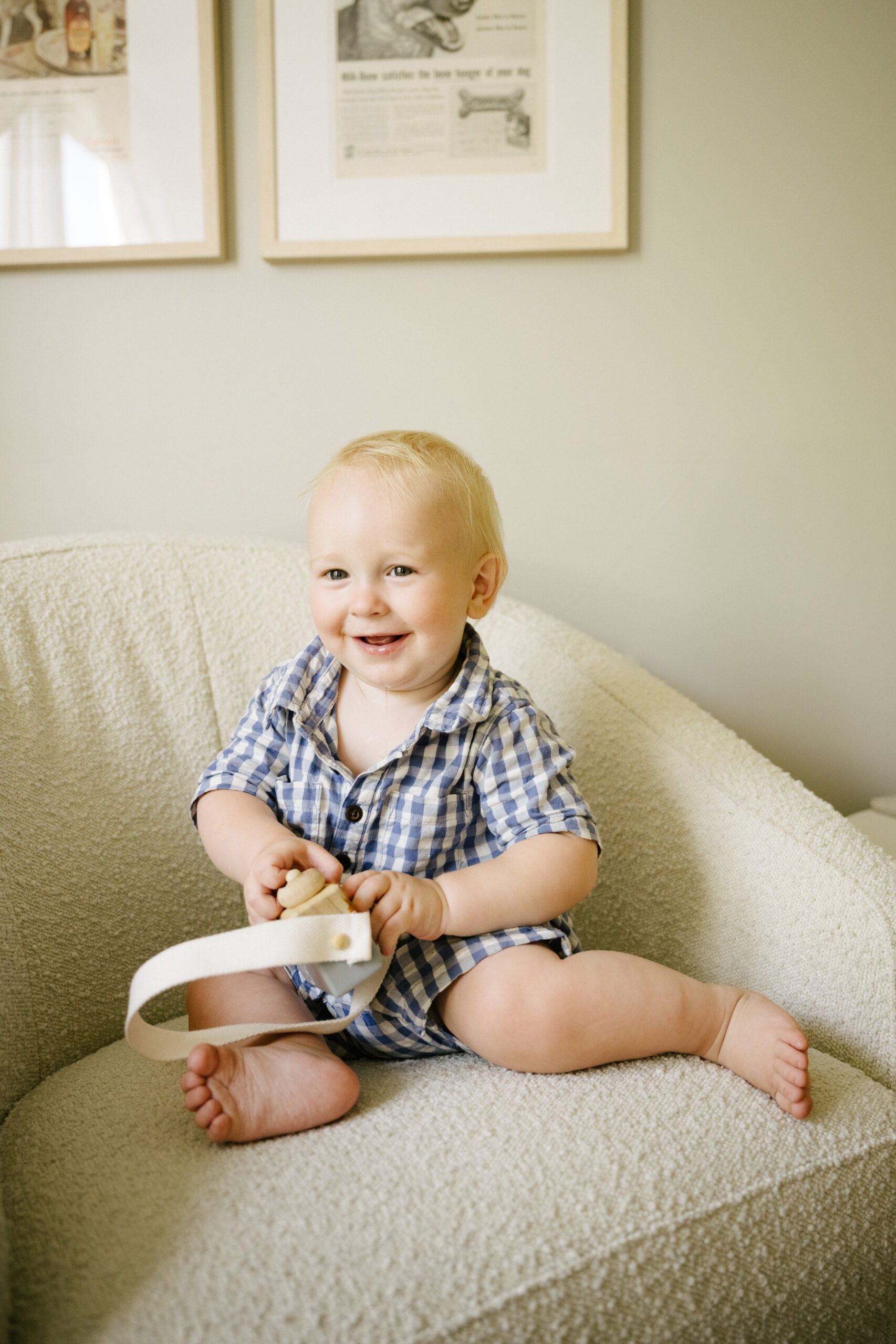 little boy in blue and white outfit