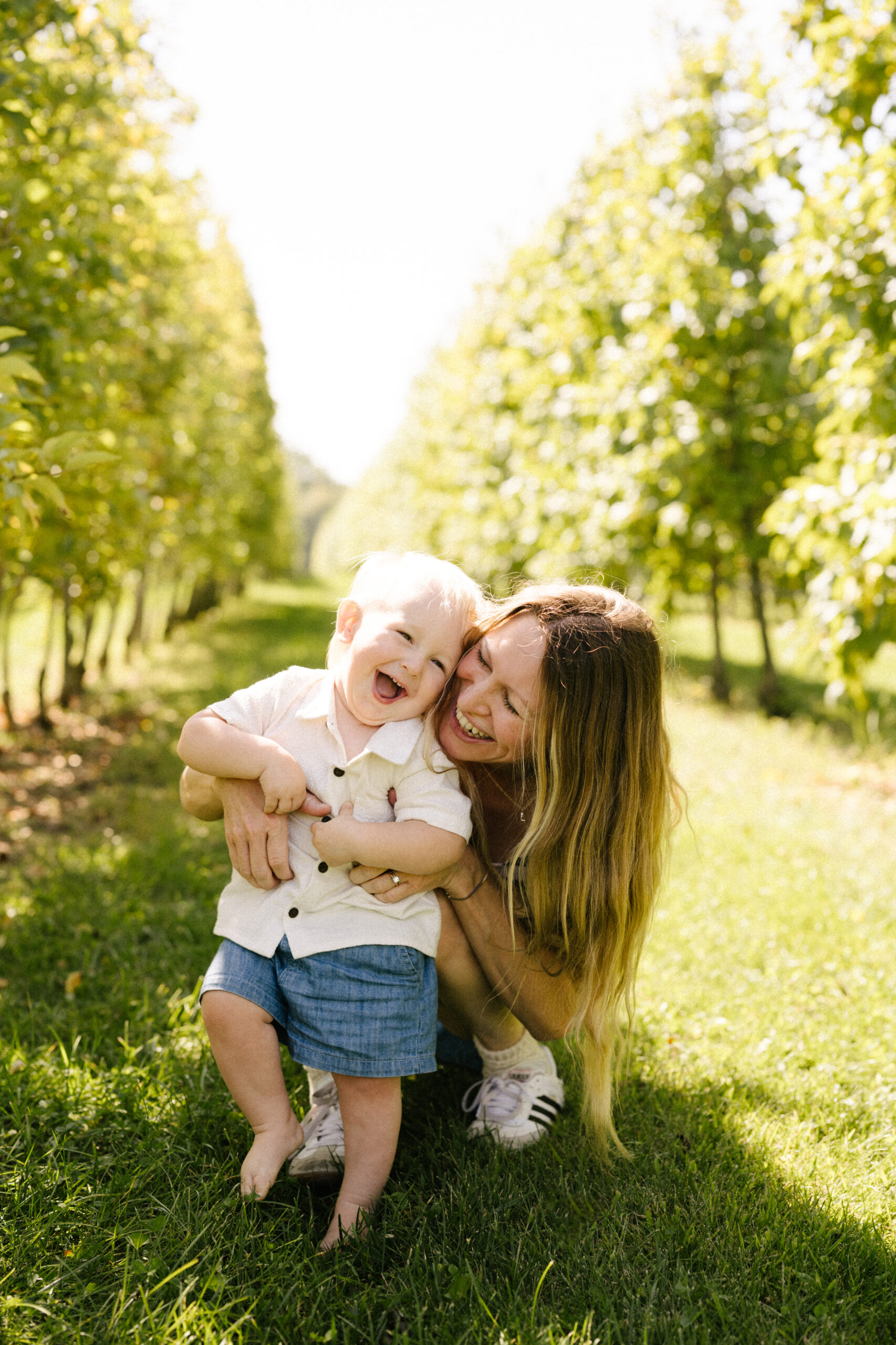 ren lenhof and baby Lake at the apple orchard