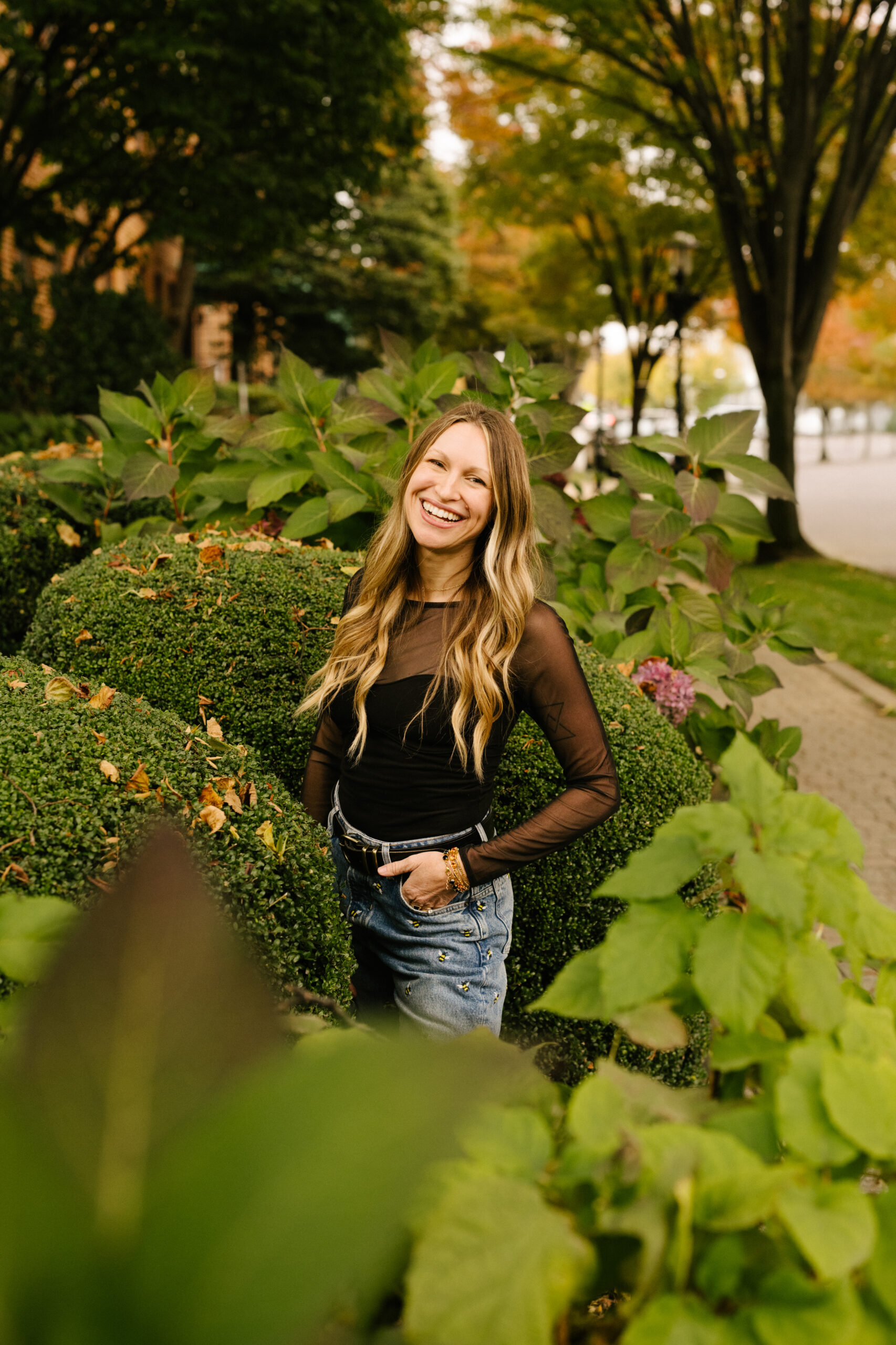 Ren Lenhof in New York Garden City smiling at camera