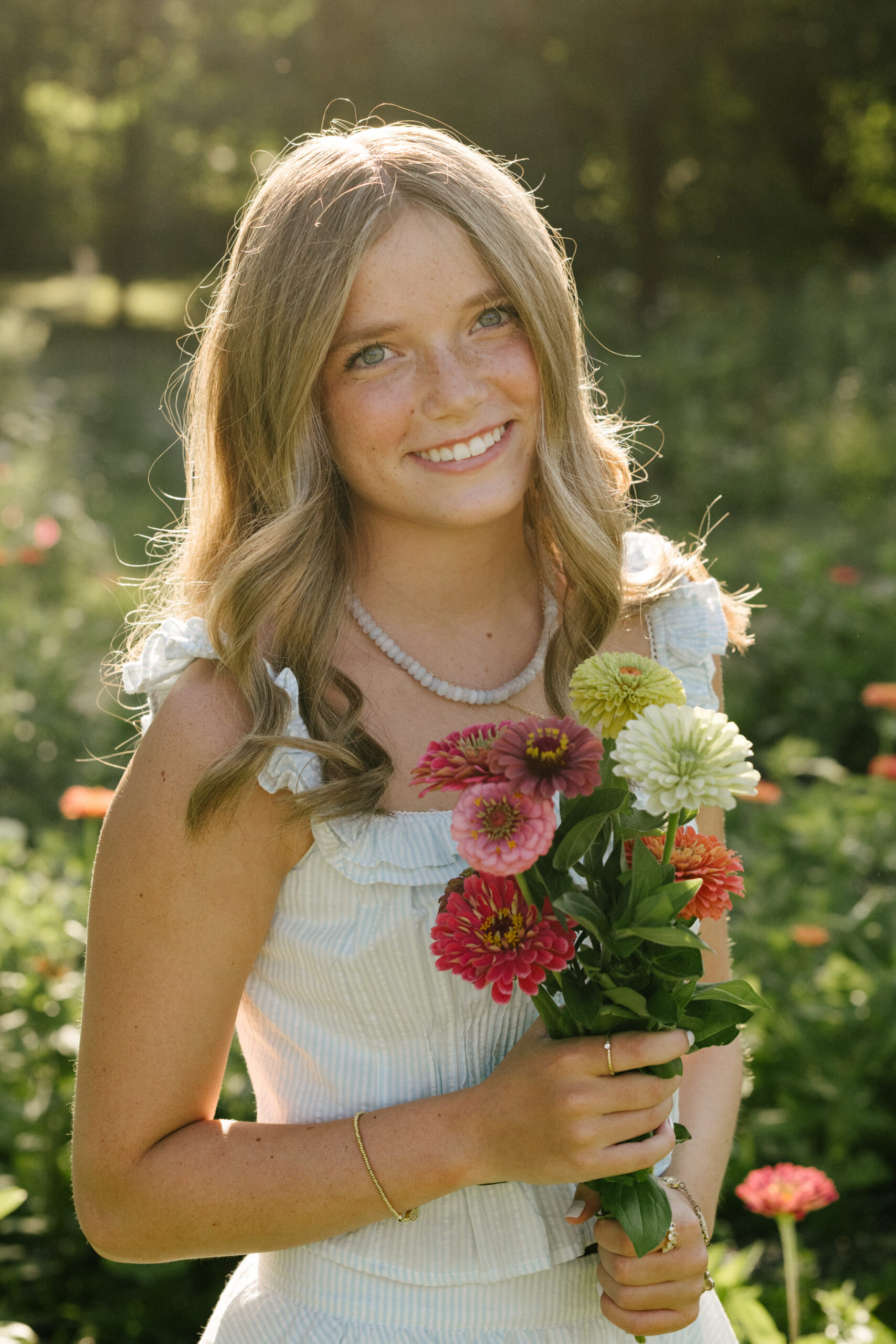 high school senior girl portrait with flowers